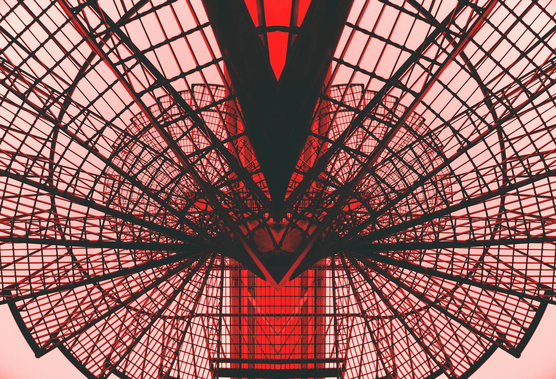 low angle photography of red metal tower