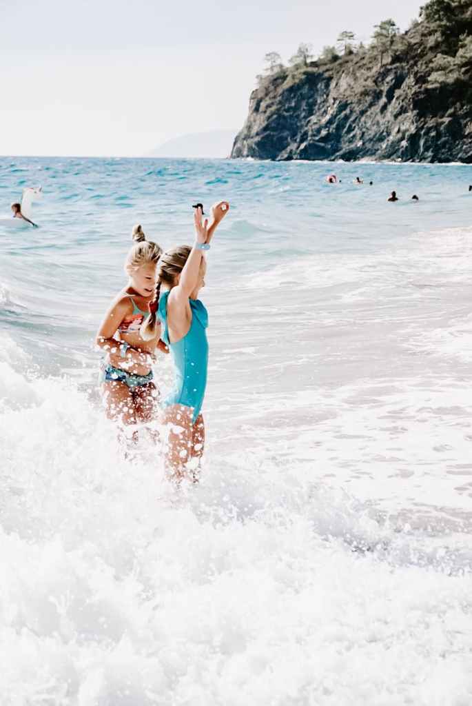 girls enjoying on beach