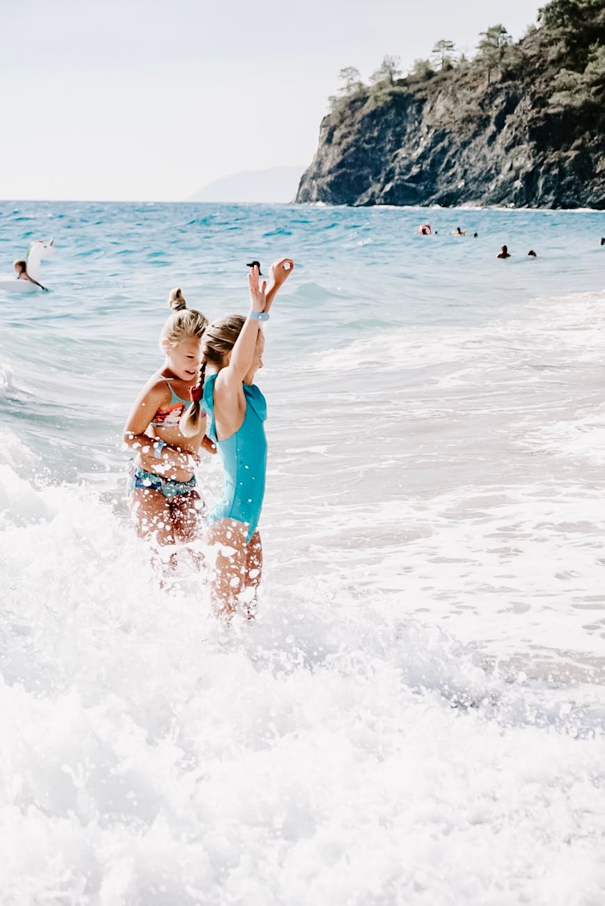 girls enjoying on beach