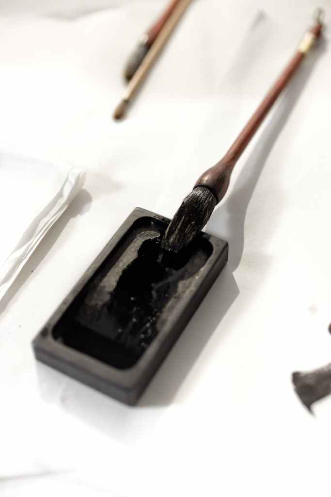 close up of a brush on white surface