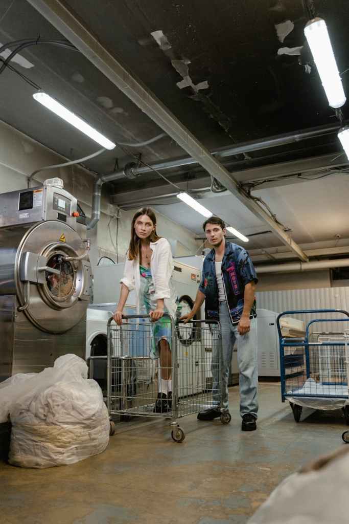 man and woman in laundry room