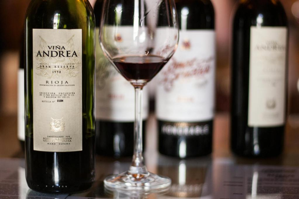 wine in glass and bottles