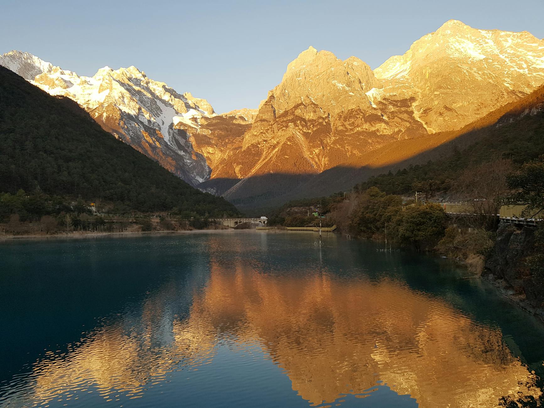 majestic jade dragon snow mountain at sunset