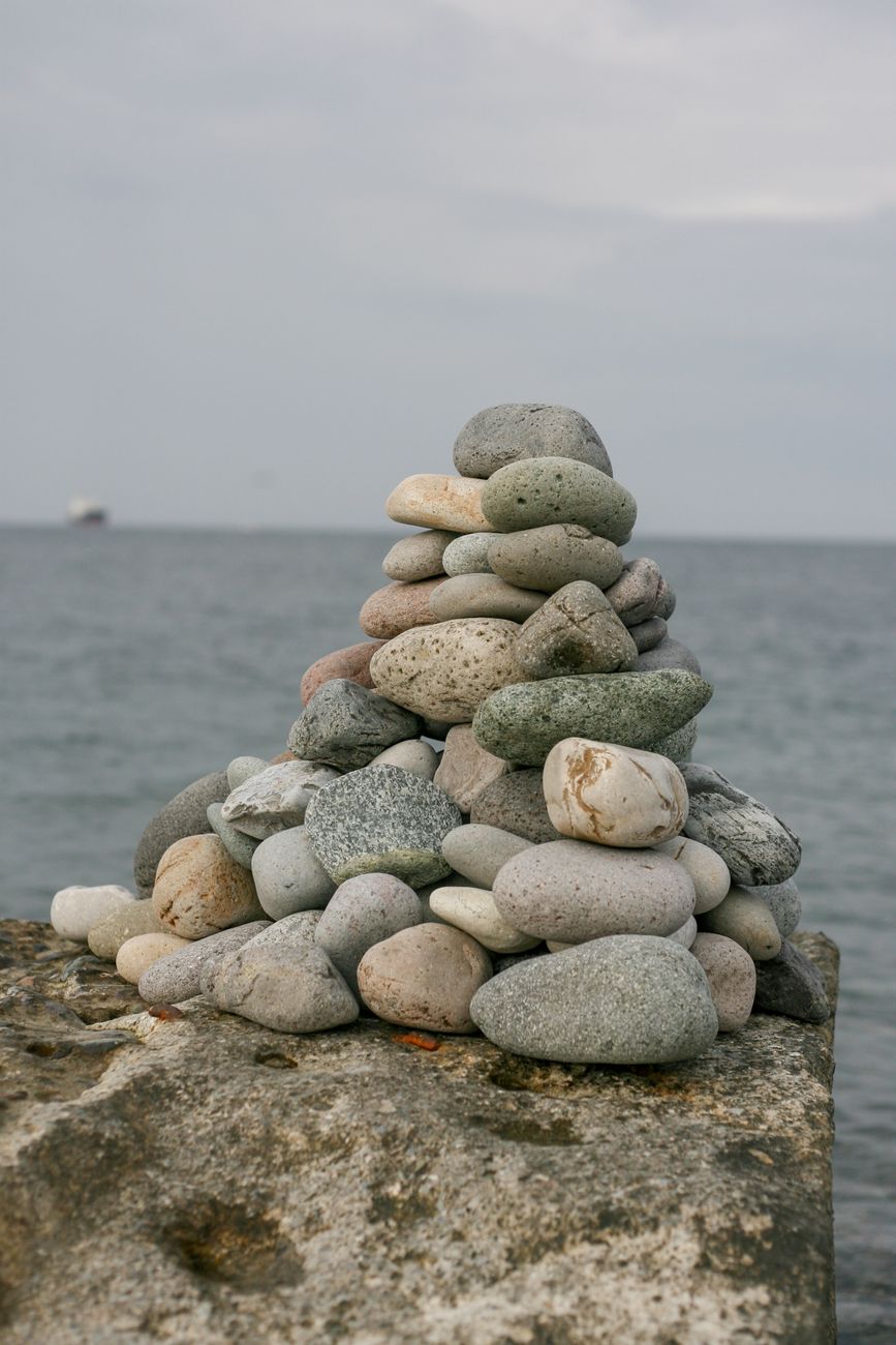 serene pebble stack by the beach