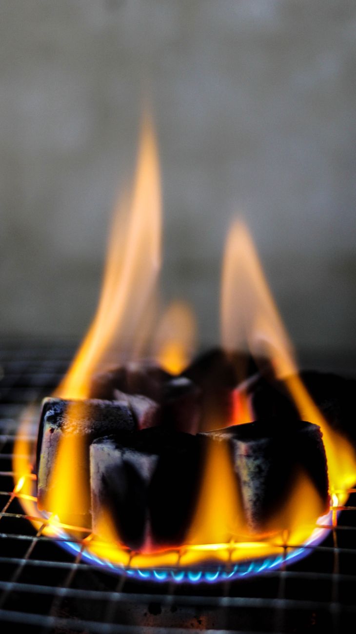 close up of burning coal cubes